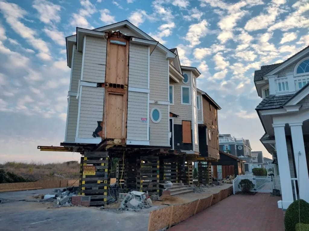 NJ home being lifted for FEMA flood compliance